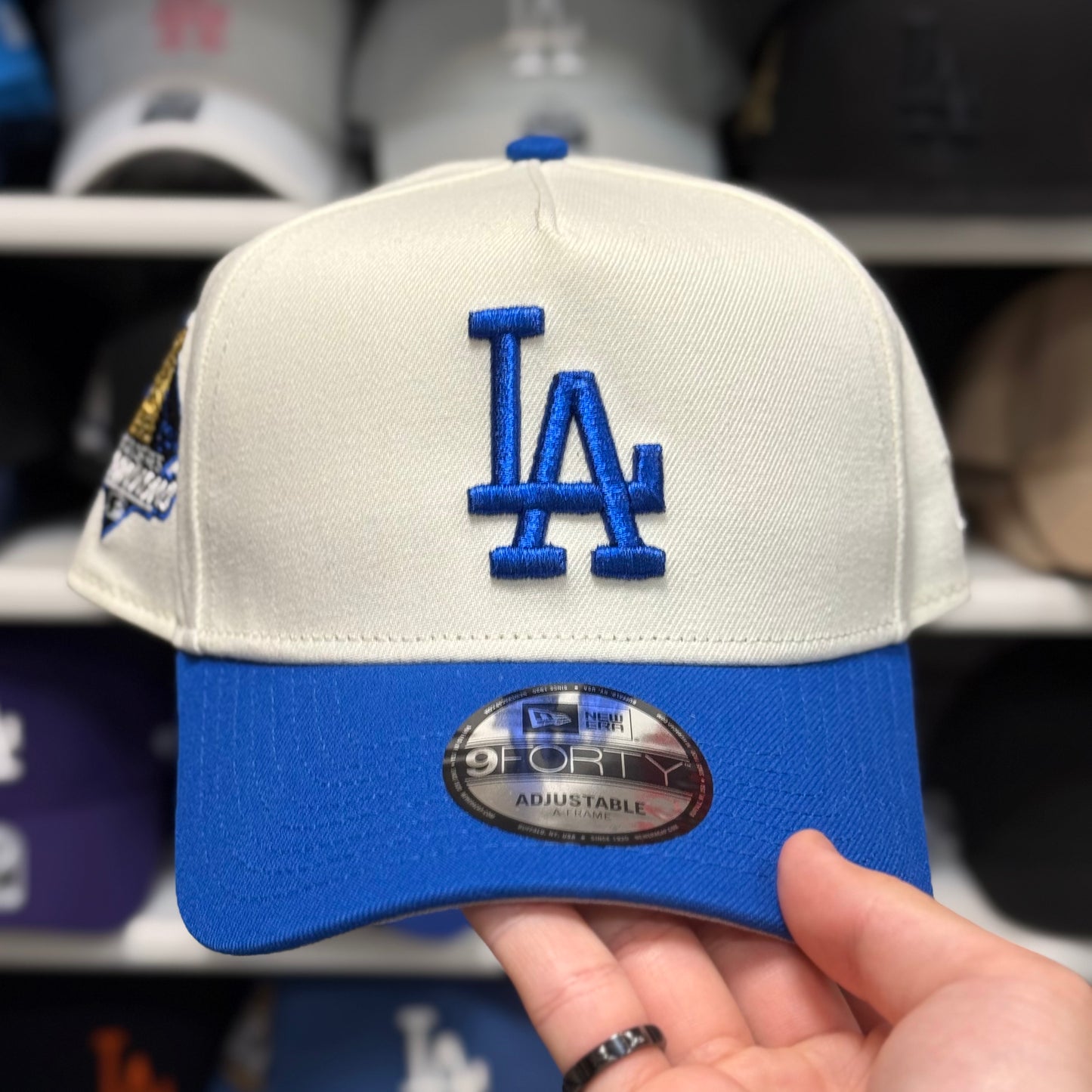New Era LA Dodgers '2024 World Series Champions' A-Frame 9FORTY Snapback Ivory/Blue
