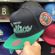 Boston Celtics 'Script Logo' Black/Green Mitchell & Ness Snapback - Product Image