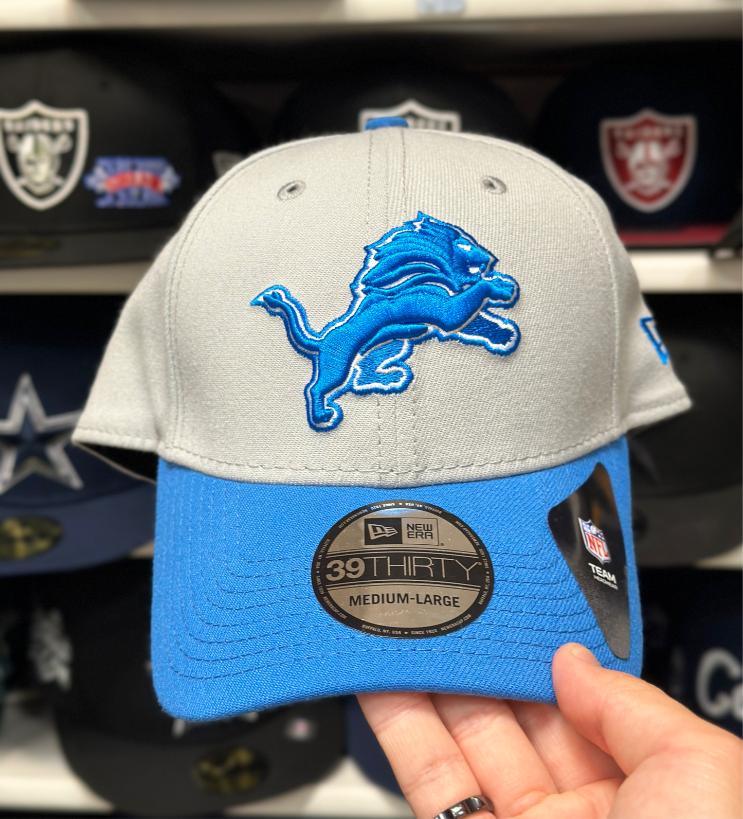 Detroit Lions NFL Ball Cap | New Era 39THIRTY Adjustable Curve Bill | Silver/Blue