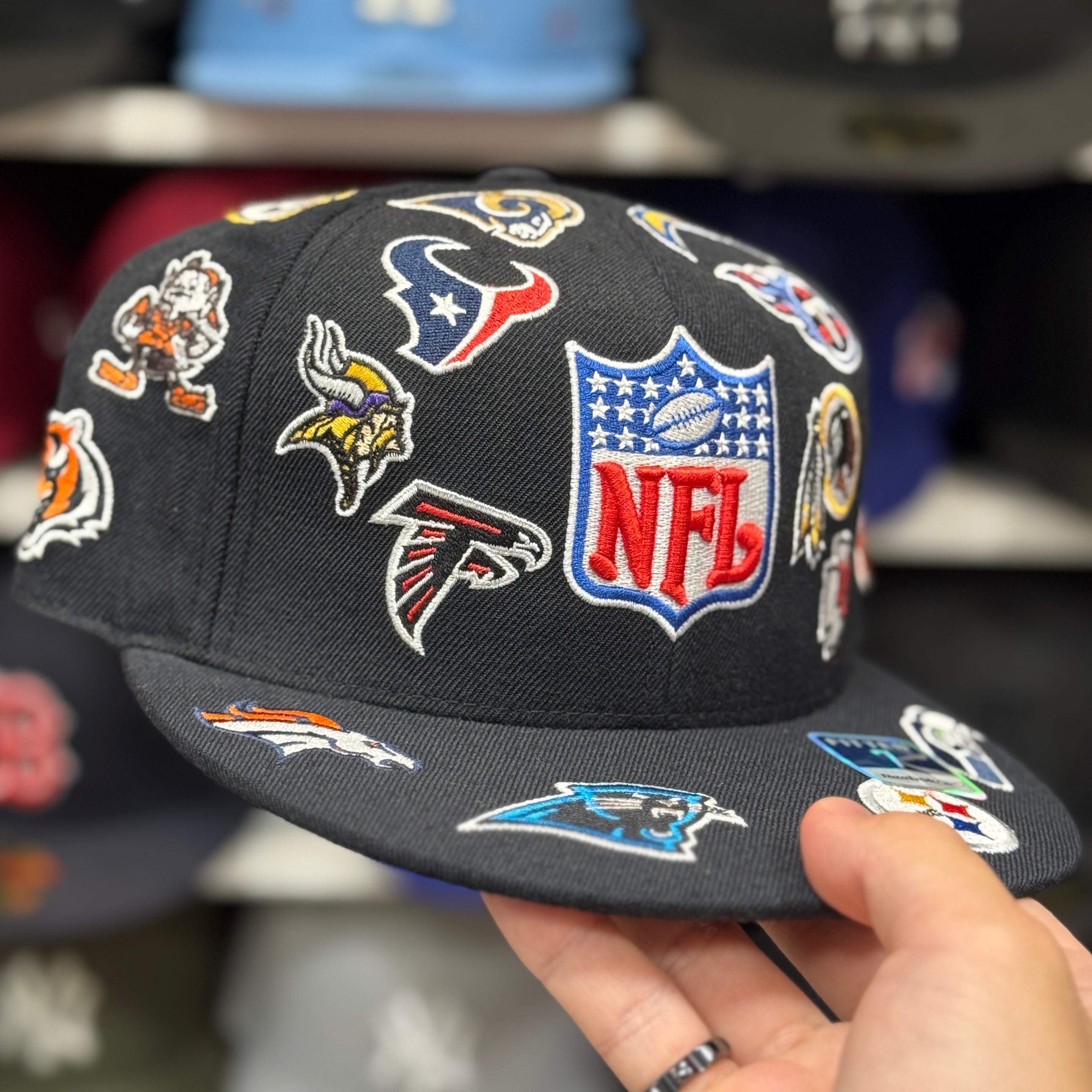 NFL 'All Over' Black Reebok Fitted Hat - Product Image