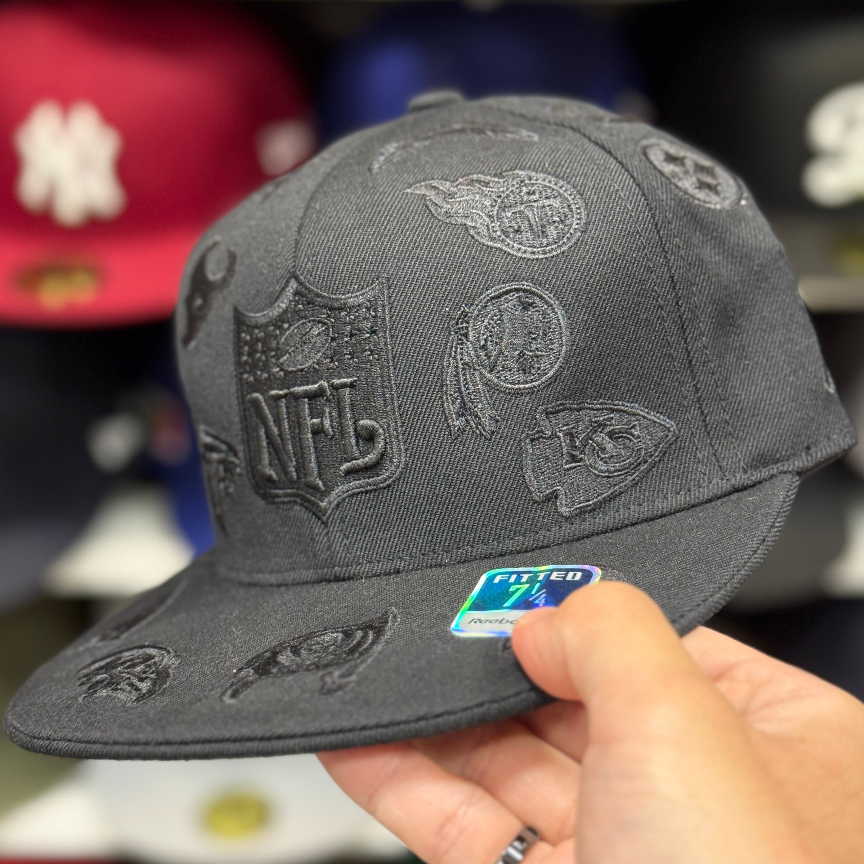 NFL 'All Over' All Black Reebok Fitted Hat - Product Image