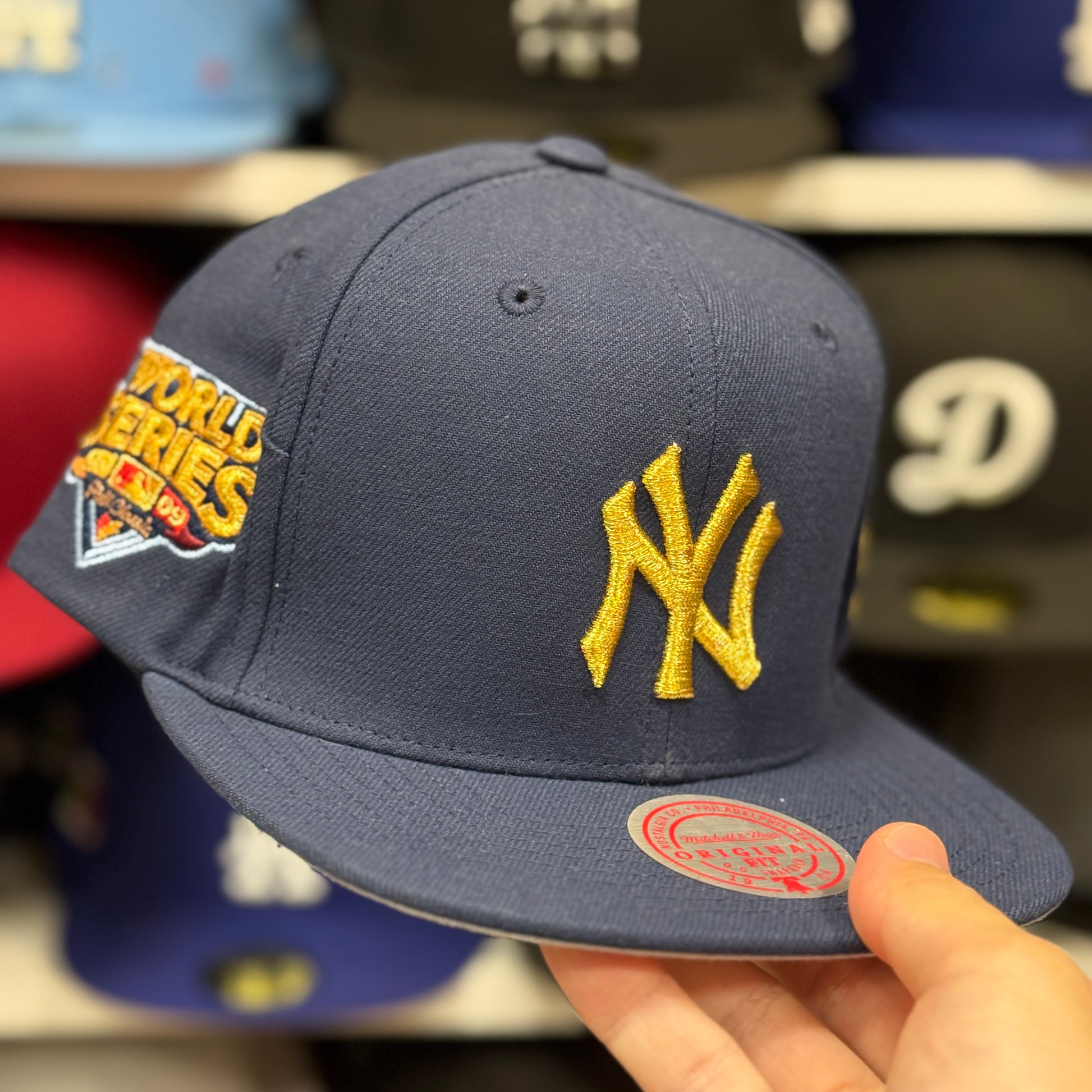 New York Yankees 'World Series Identity' Navy/Gold Mitchell & Ness Snapback - Product Image