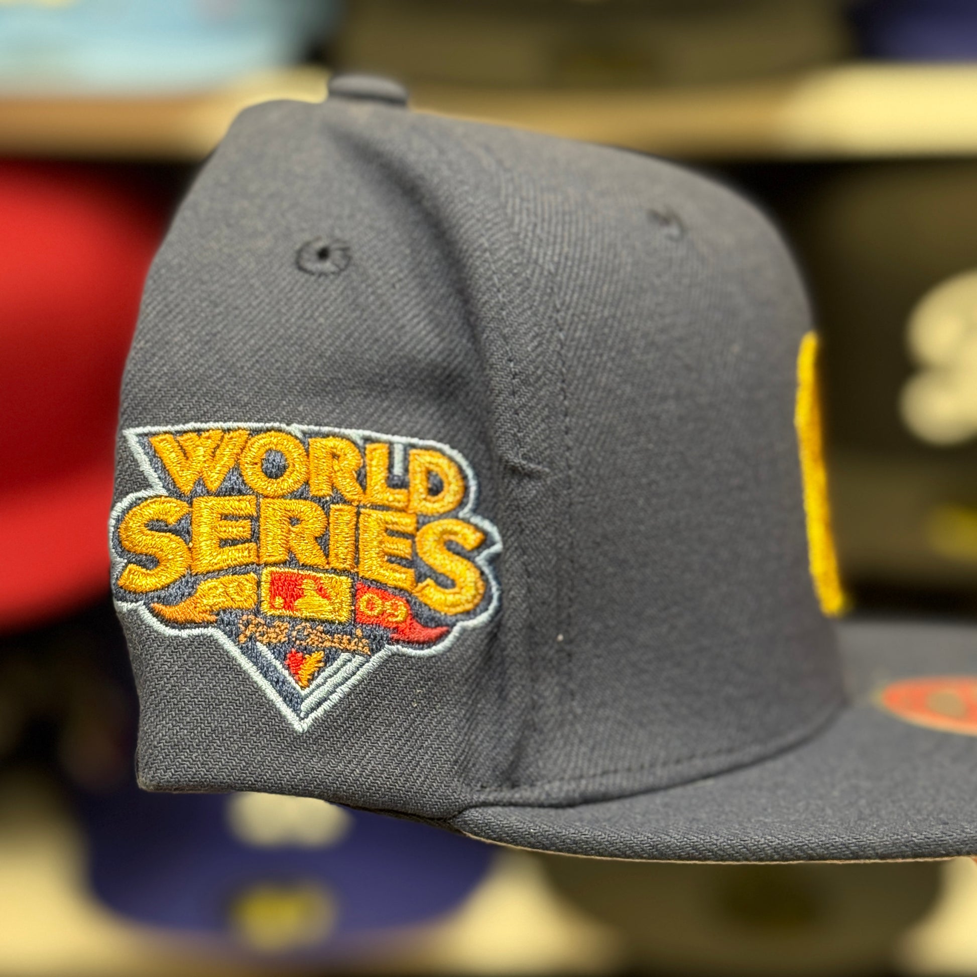 New York Yankees 'World Series Identity' Navy/Gold Mitchell & Ness Snapback - Product Image