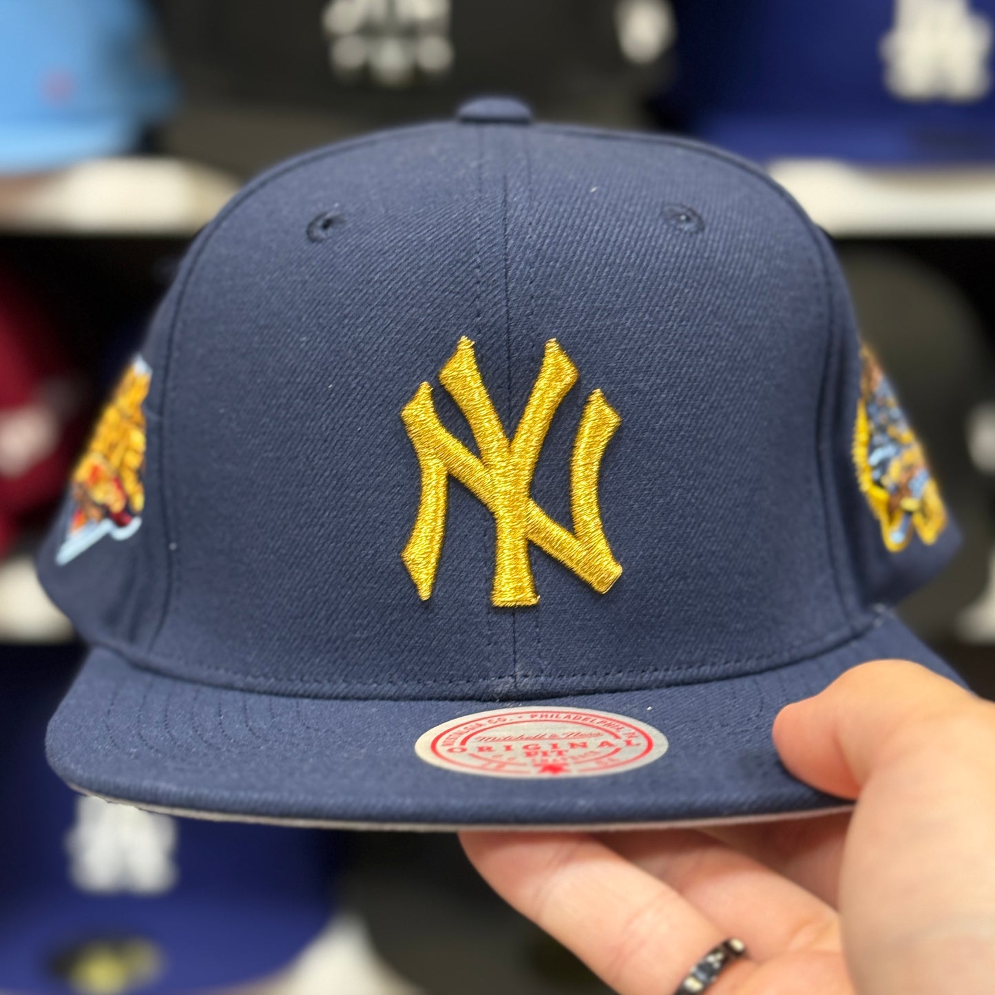 New York Yankees 'World Series Identity' Navy/Gold Mitchell & Ness Snapback - Product Image