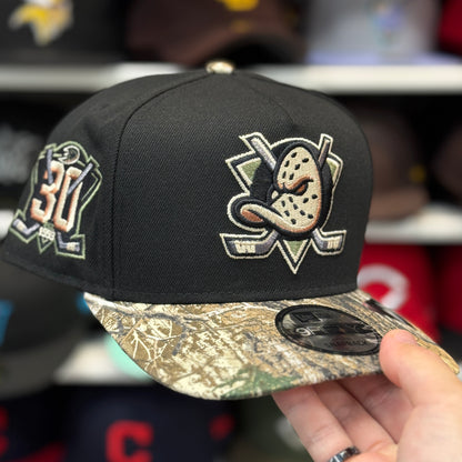 New Era Anaheim Ducks '30th Anniversary' A-Frame Black/Realtree Camo 9FIFTY Snapback - Product Image
