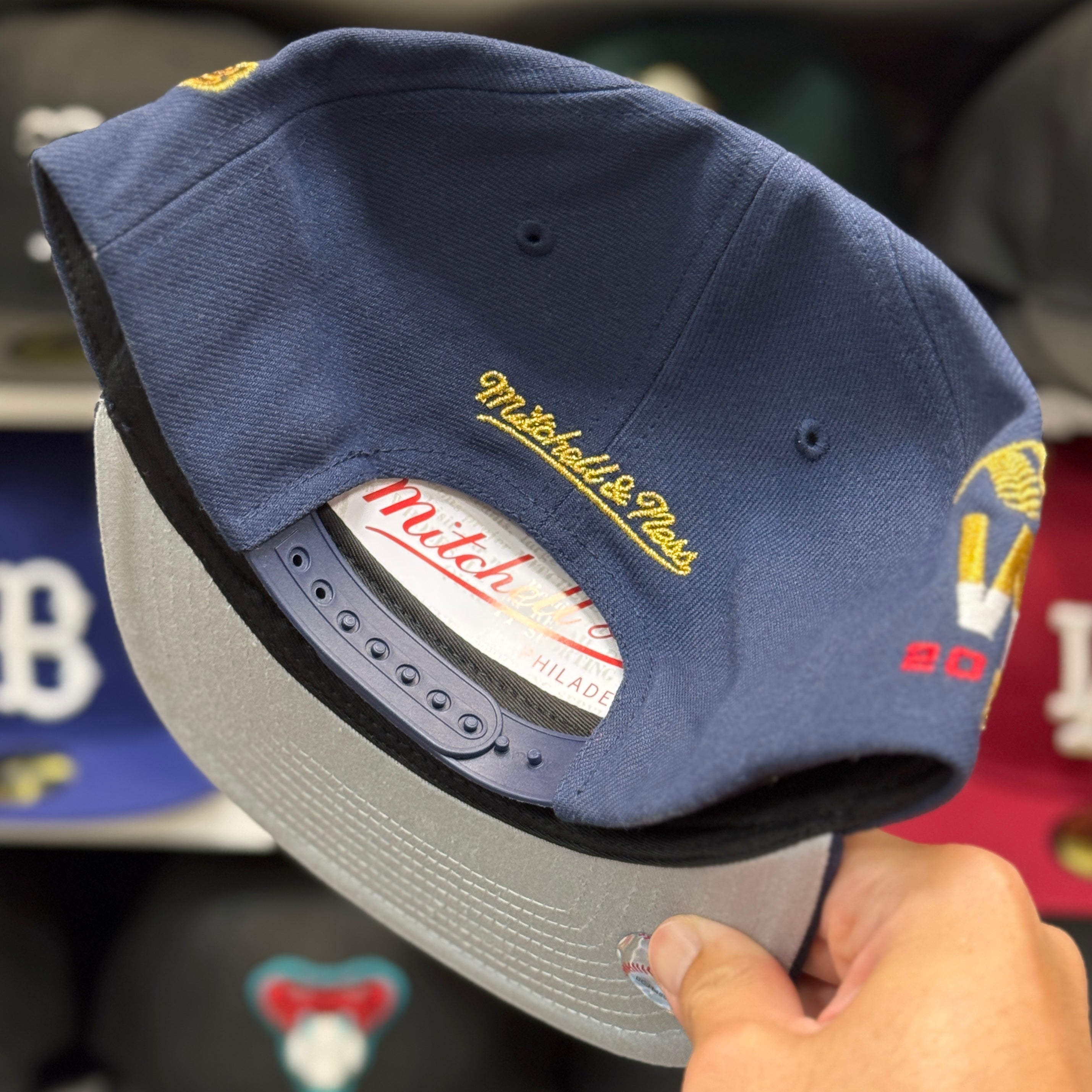 Atlanta Braves 'World Series Identity' Navy/Gold Mitchell & Ness Snapback - Product Image
