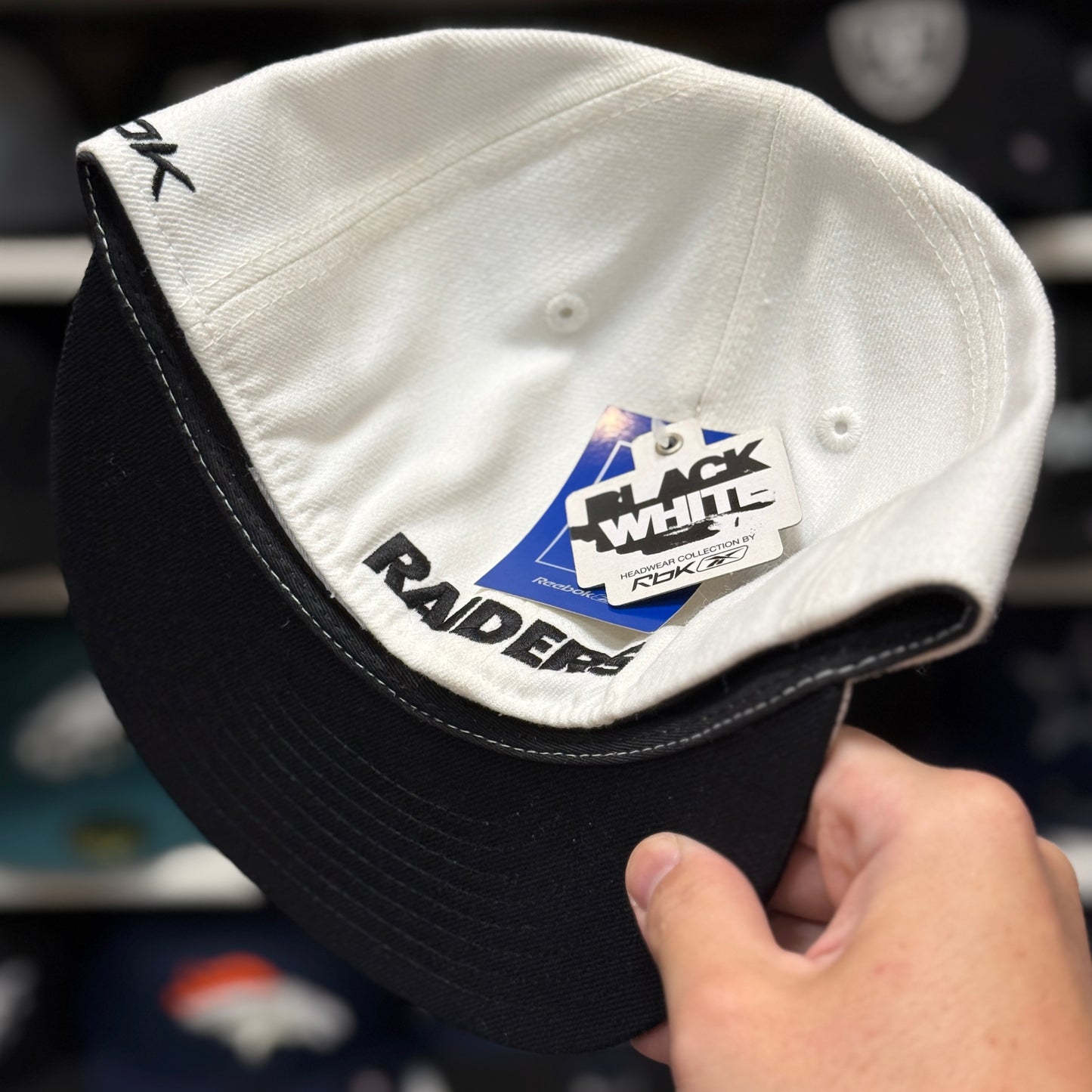 Oakland Raiders 'Black Shield' White Reebok Fitted Hat - Product Image