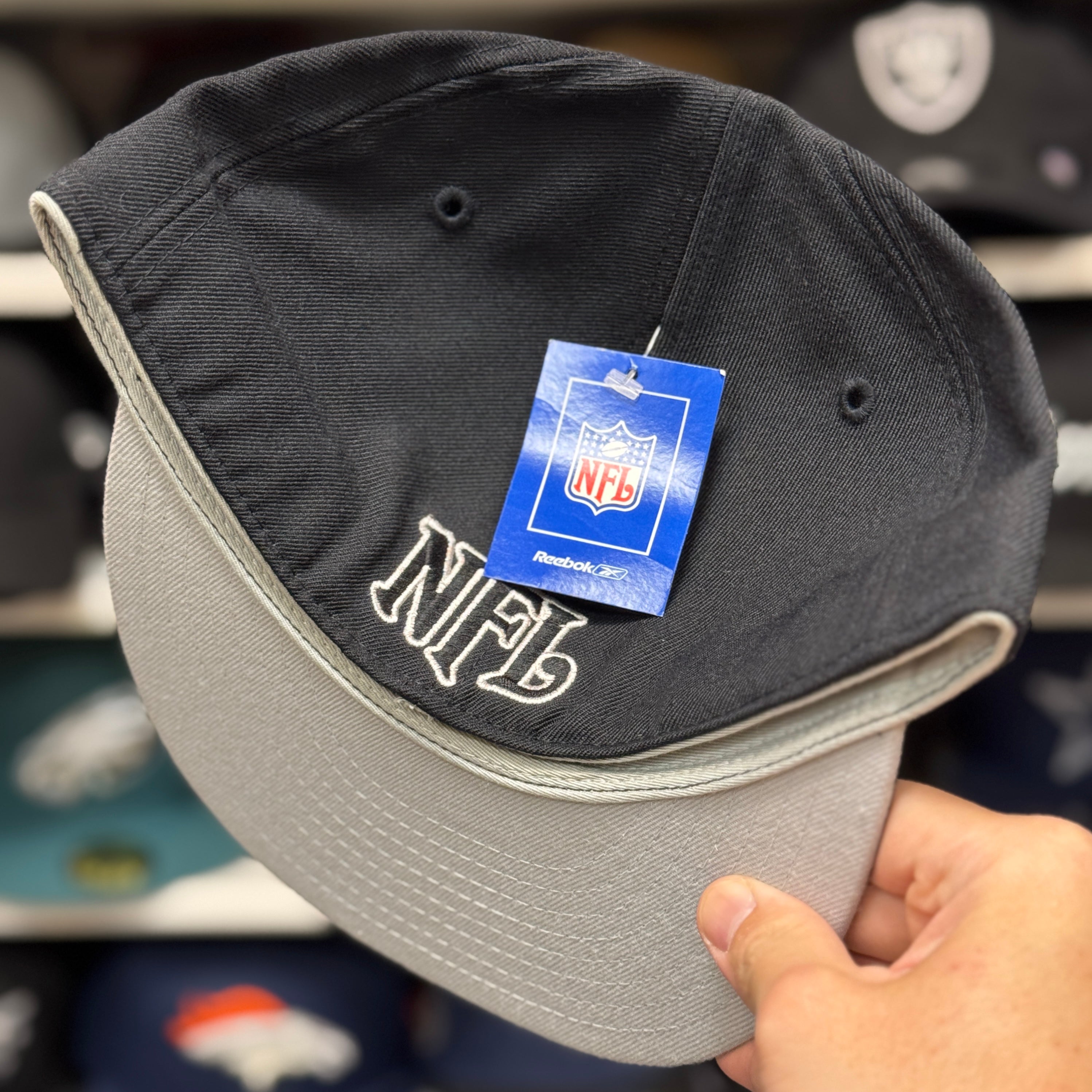 Oakland Raiders Black Reebok Fitted Hat - Product Image