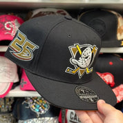 Anaheim Ducks '25th Anniversary' Black Mitchell & Ness Dynasty Fitted Hat - Product Image