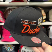 Anaheim Ducks 'Script Logo' Black/Orange Mitchell & Ness Snapback - Product Image