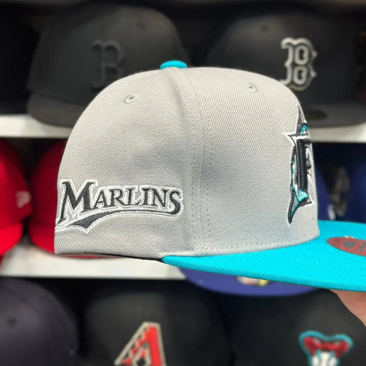 Florida Marlins Silver/Teal Mitchell & Ness Snapback - Product Image