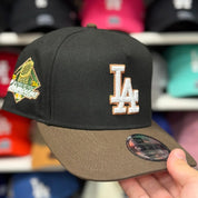 New Era Los Angeles Dodgers '2024 World Series Champions' A-Frame Black/Brown 9FIFTY Snapback - Product Image