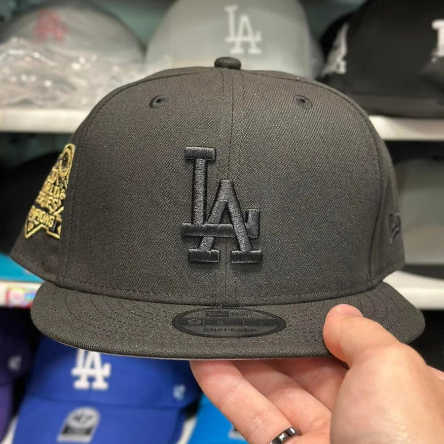 New Era Los Angeles Dodgers '2024 World Series Champions' Black/Gold 9FIFTY Snapback - Product Image