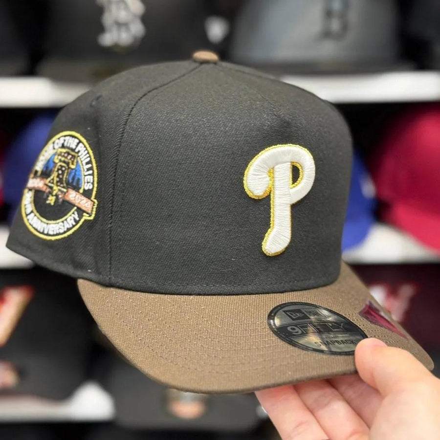 New Era Philadelphia Phillies '20th Anniversary' A-Frame Black/Brown 9FIFTY Snapback | Glow in the Dark - Product Image