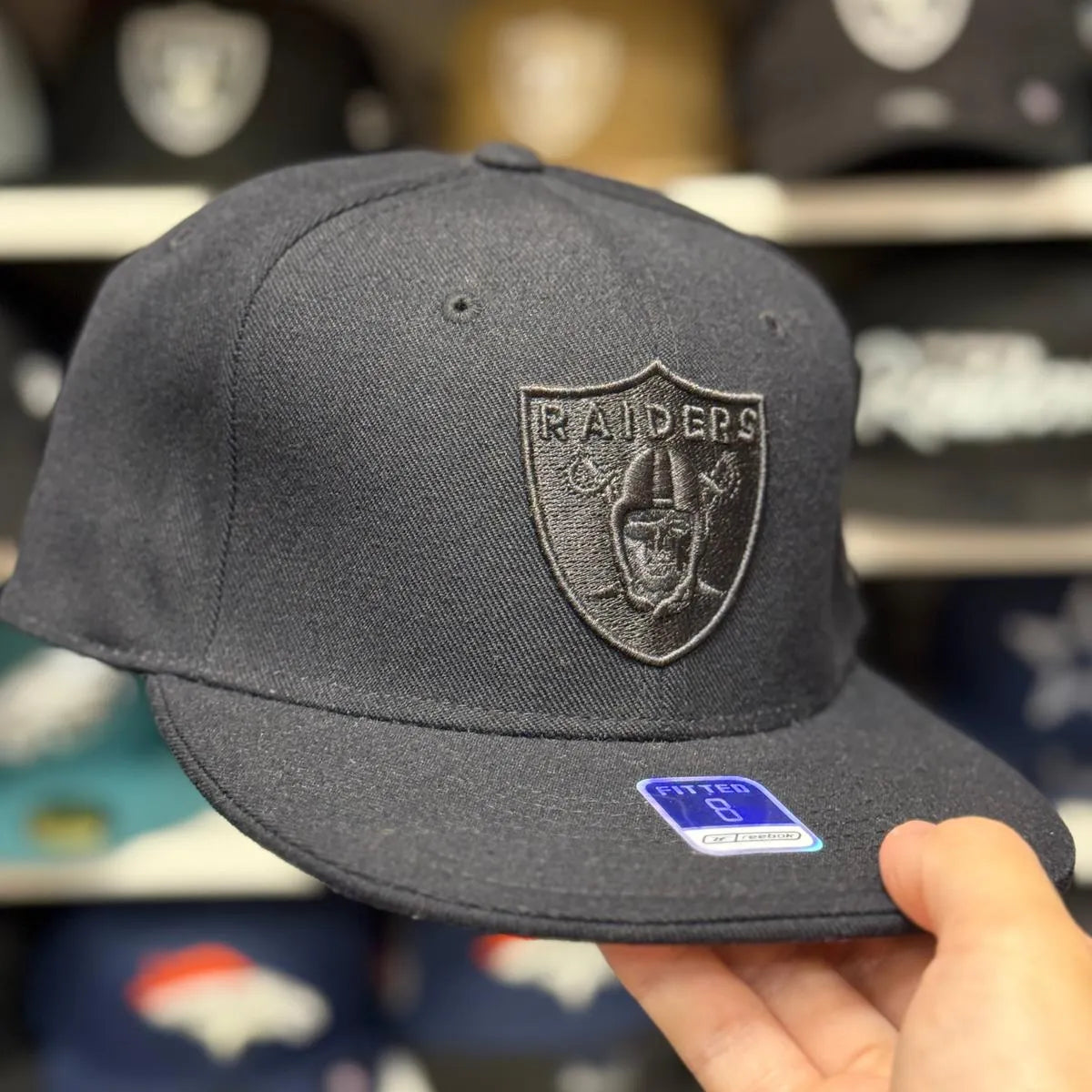 Oakland Raiders All Black Reebok Fitted Hat - Product Image