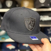 Oakland Raiders All Black Reebok Fitted Hat - Product Image