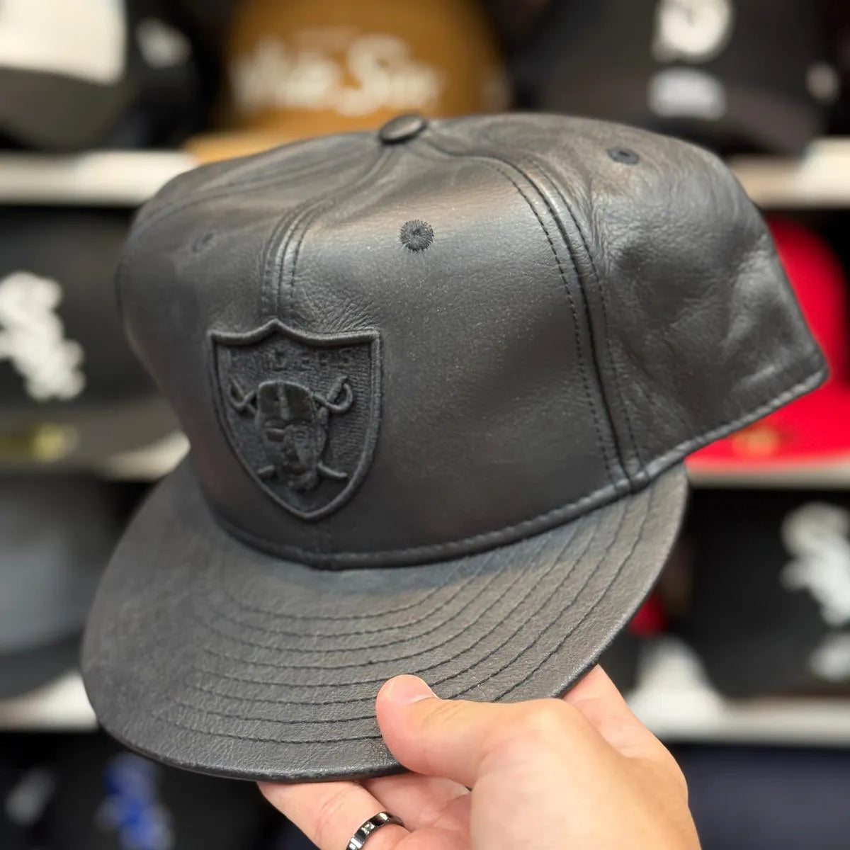 Oakland Raiders 'Full Leather' All Black Reebok Fitted Hat - Product Image